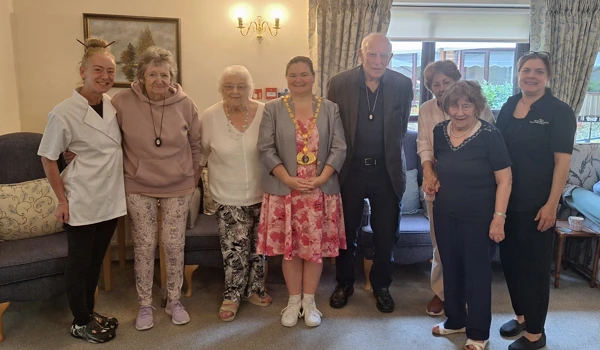 Carrot cake and community make Mayor’s visit ‘a delight’